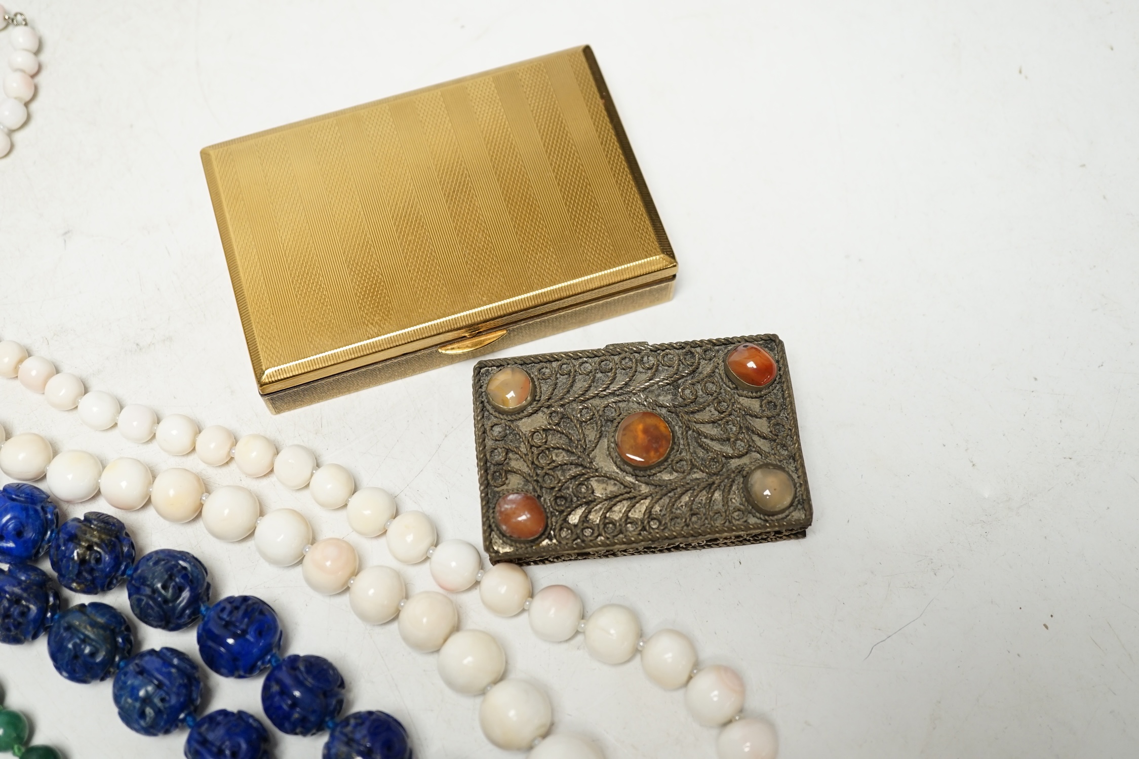 A large quantity of assorted jewellery and other collectables, including silver, costume, compacts, necklaces including carved lapis lazuli, lapis lazuli bead and white coral two yellow metal and gem set brooches, etc. C